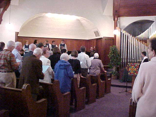 Congregation standing during When You Care