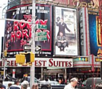 Another building with big Broadway posters plastered across the outside. Rocky Horror Show, The Producers, part of AIDA.