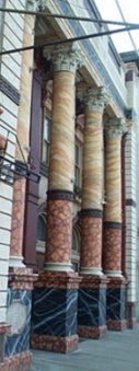 Showing are the big multi-colored pillars outside the Ensemble Theatre.