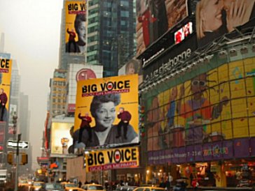 Tiimes Square with The Big Voice photo plastered all over the marquees and advertisements.