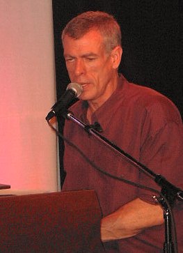 Steve Schalchlin singing at the piano.