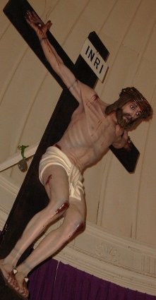 Bloody Jesus on cross.